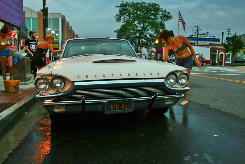 Illustration for article titled Noir Leather Bikini Car Wash Meetup Pictures
